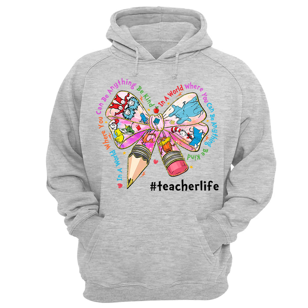 In A World Where You Can Be Anything Be Kind Custom Shirt Gift For Teacher Read Across America Day Coquette Reading Shirt H2511 Do99