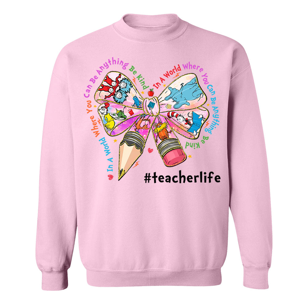In A World Where You Can Be Anything Be Kind Custom Shirt Gift For Teacher Read Across America Day Coquette Reading Shirt H2511 Do99