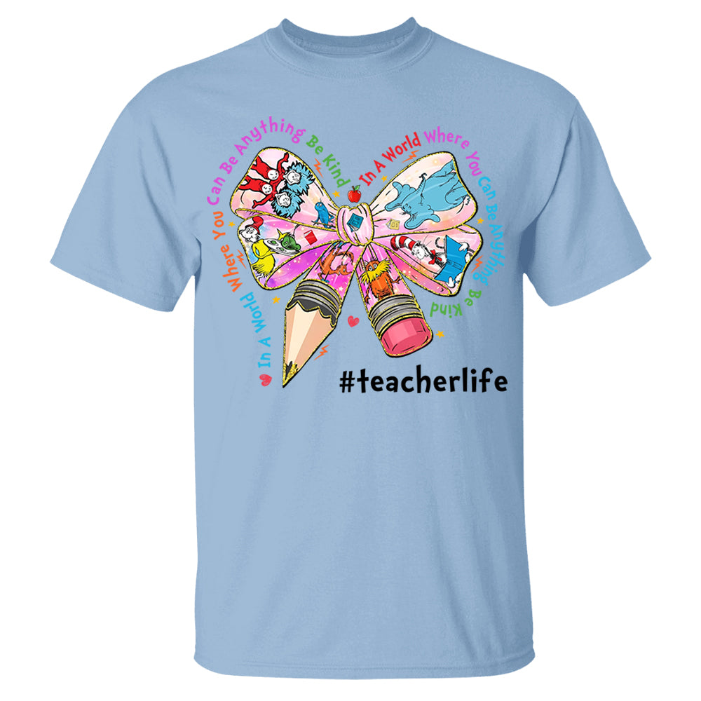 In A World Where You Can Be Anything Be Kind Custom Shirt Gift For Teacher Read Across America Day Coquette Reading Shirt H2511 Do99