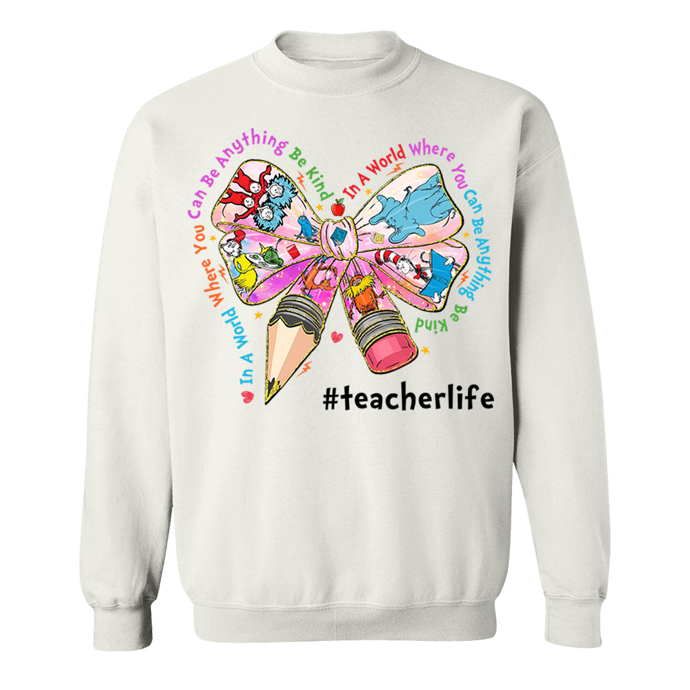 In A World Where You Can Be Anything Be Kind Custom Shirt Gift For Teacher Read Across America Day Coquette Reading Shirt H2511 Do99