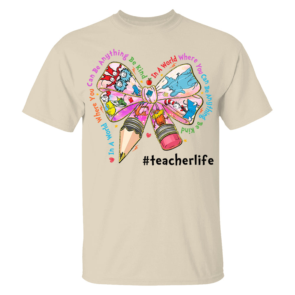 In A World Where You Can Be Anything Be Kind Custom Shirt Gift For Teacher Read Across America Day Coquette Reading Shirt H2511 Do99