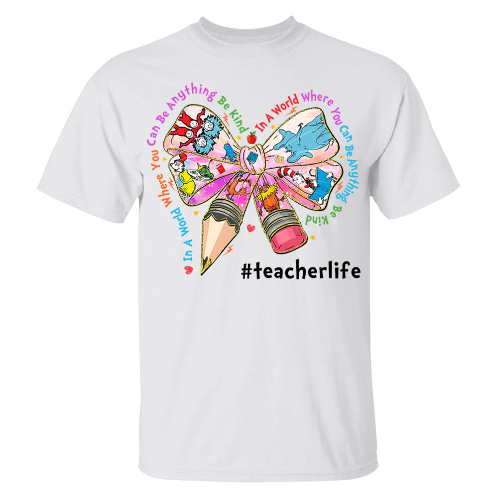 In A World Where You Can Be Anything Be Kind Custom Shirt Gift For Teacher Read Across America Day Coquette Reading Shirt H2511 Do99