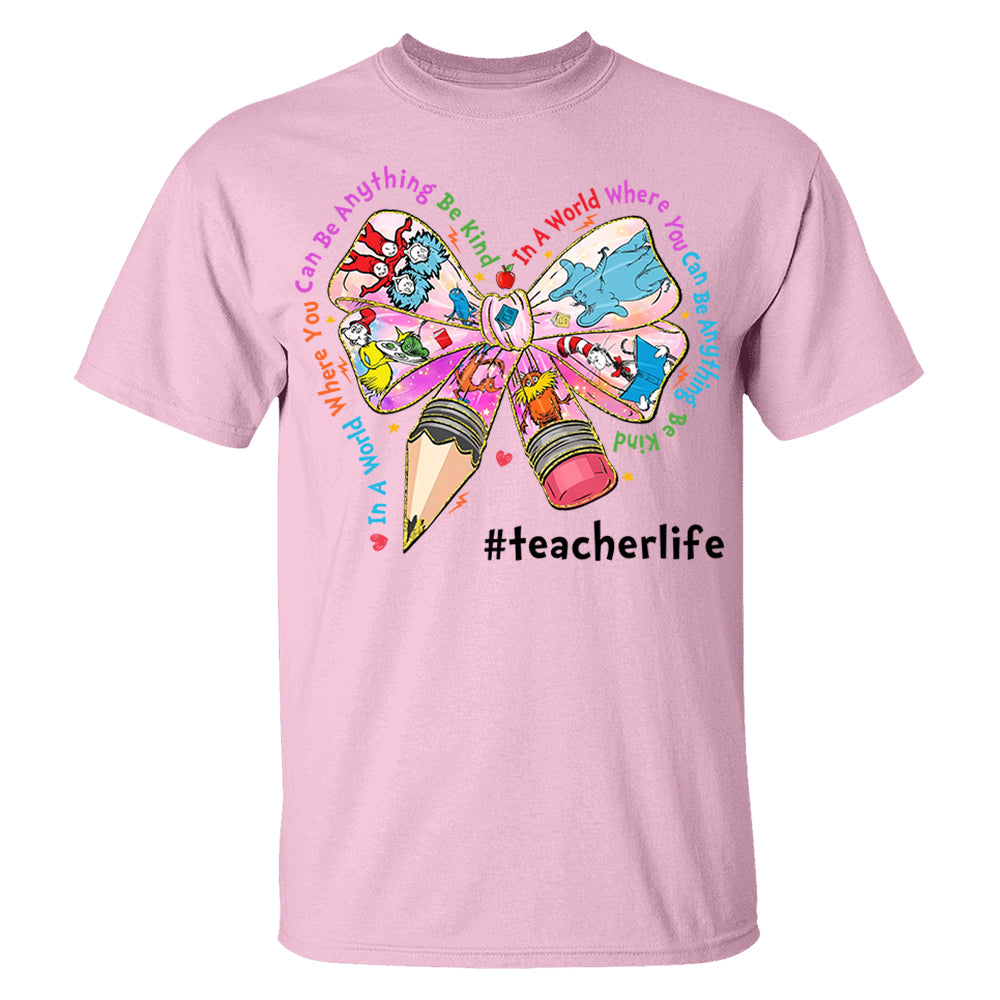 In A World Where You Can Be Anything Be Kind Custom Shirt Gift For Teacher Read Across America Day Coquette Reading Shirt H2511 Do99